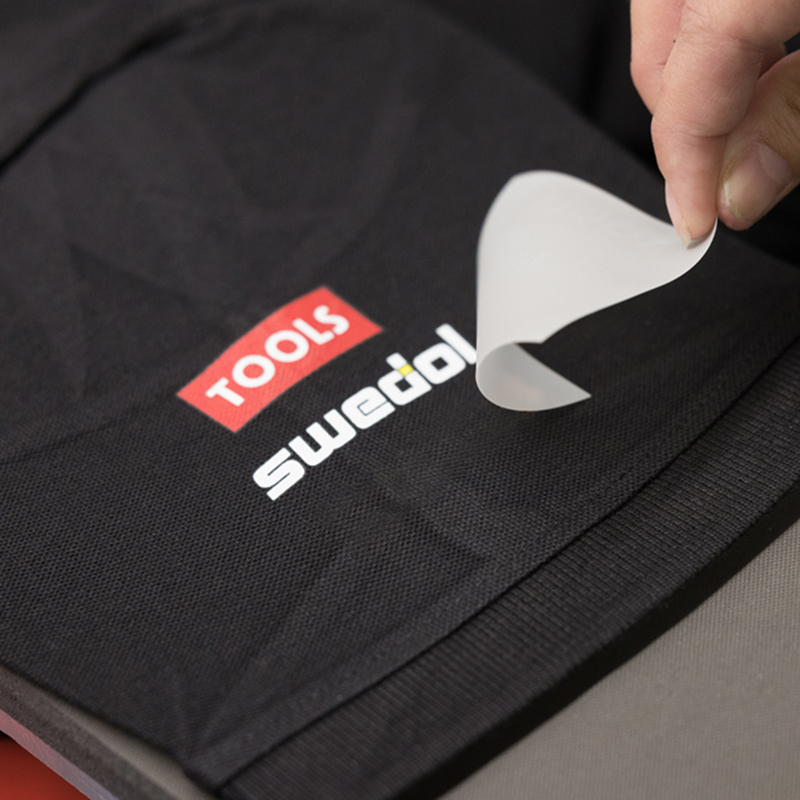 Swedol and TOOLS logos on a garment